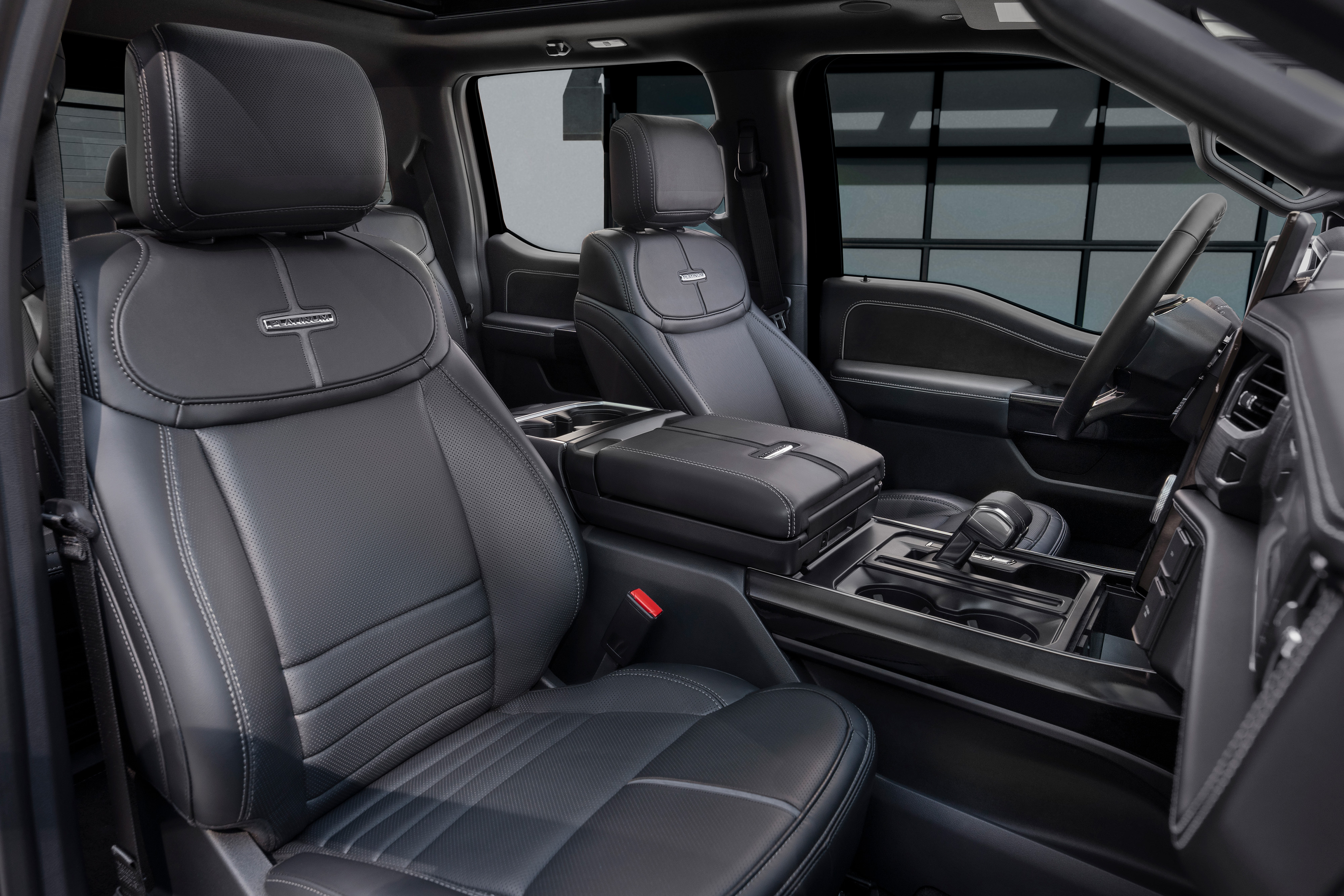 The sleek black interior of the 2025 F-150® Lightning® Dark Elements package.